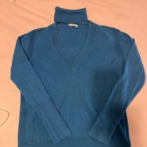 Turtlenecks are universally flattering AND can be sexy